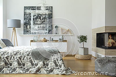 Warm bedroom interior with fireplace Stock Photo