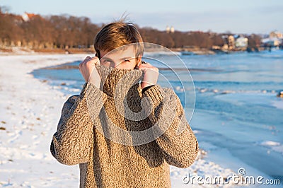 Warm clothes for cold season. Winter fashion. Warm sweater. Man traveling in winter, nature. man in warm clothes Stock Photo