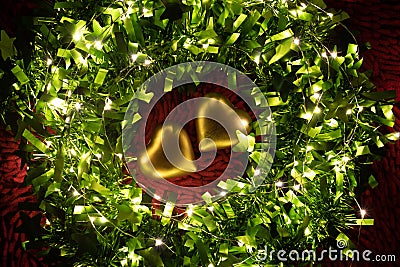 A warm color light garland surrounding two hearts. valentine`s day Stock Photo