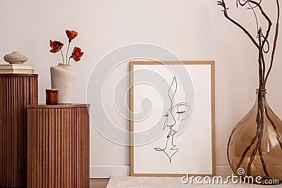 Warm and cozy composition of living room interior with mock up poster frame, wooden stand and stylish personal accessories. Vase Stock Photo