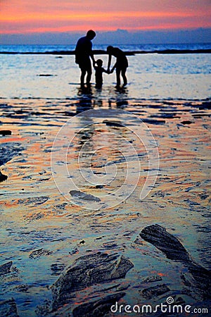 A warm family on The Golden beach and coast Editorial Stock Photo