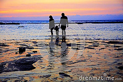 A warm family on The Golden beach and coast Editorial Stock Photo