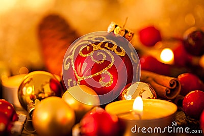 Warm gold and red Christmas candlelight background Stock Photo