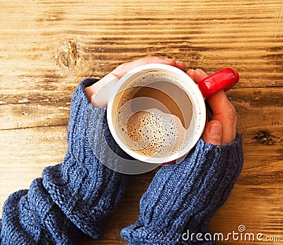 Warm Hands Holding Chocolate Cup Stock Photo