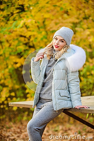 Warm knitwear. Clothes for rest. Girl relaxing in nature wearing knitwear suit and jacket. Model knitwear clothes leaves Stock Photo