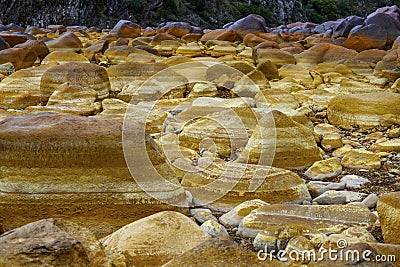 Orange Mineral Formations and Puddles at Rio Tinto Stock Photo