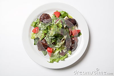 Warm salad with chicken liver Stock Photo