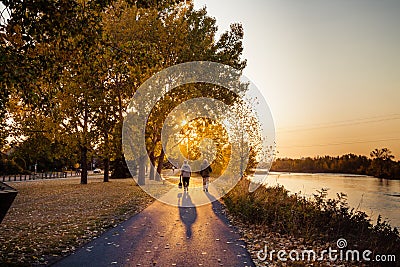 An early morning stroll on a river path Stock Photo