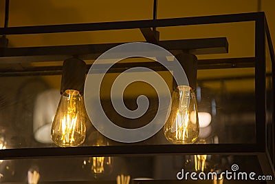 Warm tone light bulb lamp.decorative with wall room yellow Stock Photo