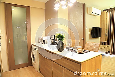 Warm tone of luxury interiors design in the condominium, as background. Stock Photo