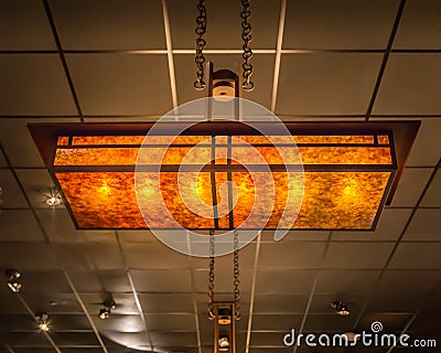 Warm and Unique Amber Commercial Light Fixture Stock Photo