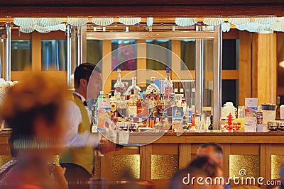 Warnemunde, Rostock, Germany - Jul 06, 2018: In evening in bar on cruise liner Editorial Stock Photo