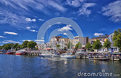 WarnemÃ¼nde, Rostock, Germany A view of the canal that runs through the center of this tourist town lined with restaurants, stores Editorial Stock Photo