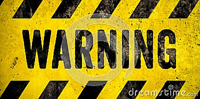 WARNING danger sign word text as stencil with yellow and black stripes painted over concrete wall cement texture background Stock Photo