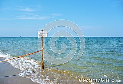 Warning Sign on the beach of the nature reserve at the mouth of the river Bevano Stock Photo