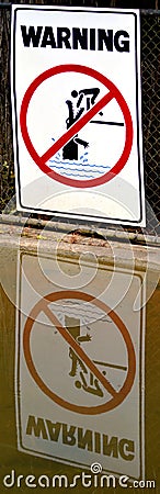 Warning sign - danger crocodiles, no swimming Stock Photo