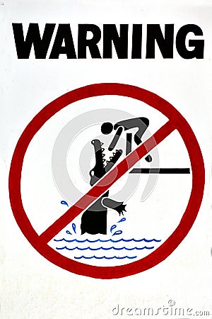 Warning sign - danger crocodiles, no swimming Stock Photo