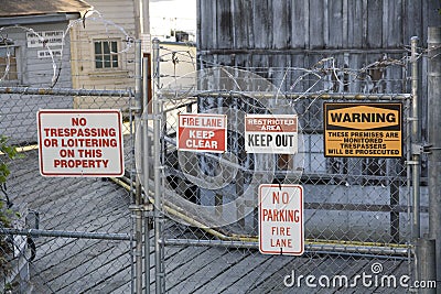 Warning signs old factory Stock Photo