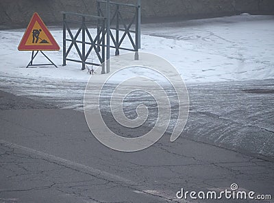 road works sign in the snow Stock Photo