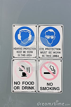 Warning Signs on Wall Stock Photo