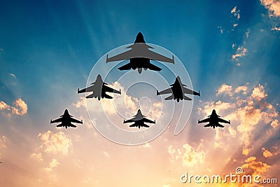 Warplanes at sunset Stock Photo