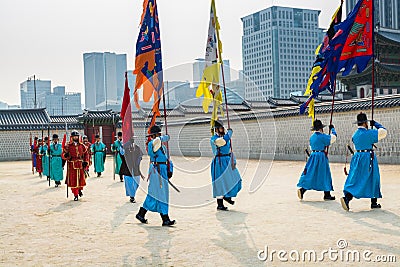 Warriors of the Royal guard in historical costumes in daily Ceremony of Gate Guard Change near the Gwanghwamun, the main Gate of Editorial Stock Photo