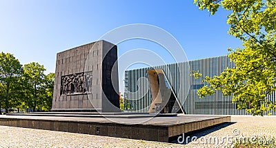 Warsaw Ghetto Heroes monument by Albert Speer in front of POLIN Museum of the History of Polish Jews in historic Jewish ghetto Editorial Stock Photo