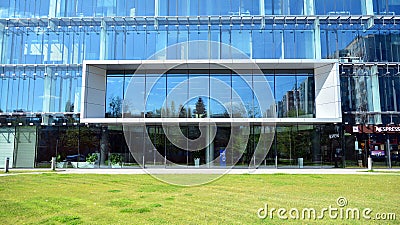 Architectural fragment of the entrance of the modern office building in Mokotow district. Editorial Stock Photo