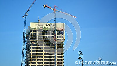 Office building Forest under construction against blue sky Editorial Stock Photo