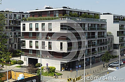 Warsaw, Poland - July 21, 2020: Landscape corner of the house and part of the street Editorial Stock Photo