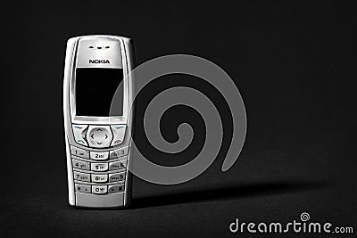 WARSAW, POLAND - JUNE 30 2022: Cell Phone Nokia 6610 on black bakcground Editorial Stock Photo