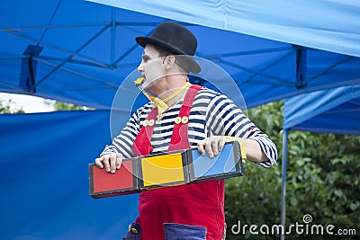 Clown during outdoor performance on Kids Day Editorial Stock Photo