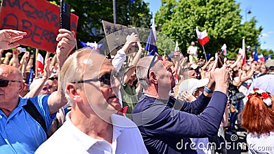 Warsaw, Poland. 4 June 2023. Hundreds of thousands march in anti-government protest to show support for democracy. Editorial Stock Photo