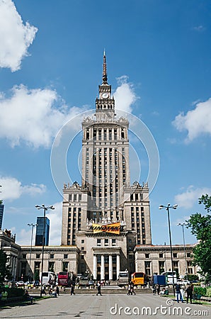 WARSAW, POLAND - JUNE 15, 2016: People walking in front of Palace of Culture and Science, skyscraper, symbol of communism and Editorial Stock Photo