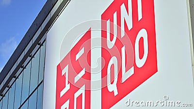 Warsaw, Poland. 8 March 2023. Sign Uniqlo. Company signboard Uniqlo. Editorial Stock Photo