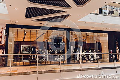 WARSAW. POLAND - MAY 21, 2023: Bershka brand retail shop logo signboard on the storefront in the shopping mall Editorial Stock Photo