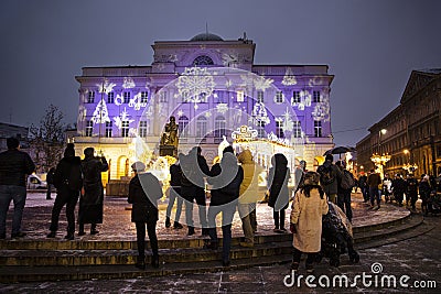 Warsaw, Poland. Nowy Swiat street. Palac Staszica festive Christmas illumination Editorial Stock Photo