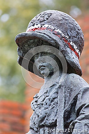 Symbolic monument of the Little Insurrectionist, a child hero fighting in the Warsaw Uprising 1944 , Warsaw, Poland Editorial Stock Photo