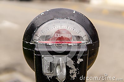 Warwick, NY / United States - Sept. 26, 2020: Landscape closeup of an old worn expired parking meter Stock Photo