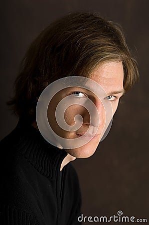 Wary Young Male Portrait Stock Photo