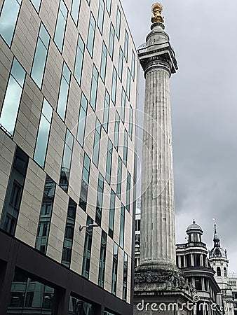 The Monument to the Great Fire of London commemorating the Great Fire of London, it stands at the junction of Monument Street and Editorial Stock Photo