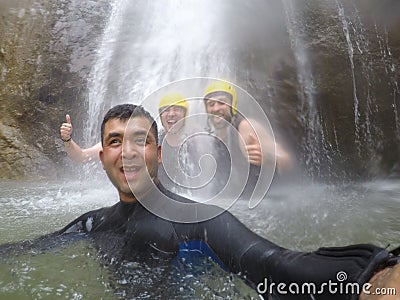 Jalbire Canyoning having fun in waterful. Editorial Stock Photo