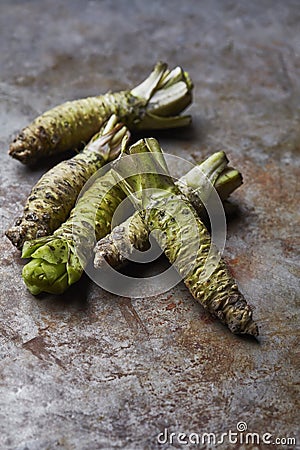 Wasabi roots on a rustic background Stock Photo