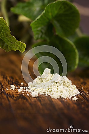 Wasabi roots on wooden background Stock Photo