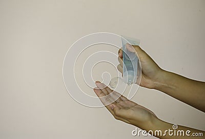 Wash hands with alcohol gel. Stock Photo