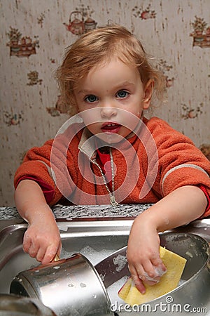 Washing the dishes Stock Photo