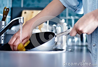 Washing the dishes Stock Photo