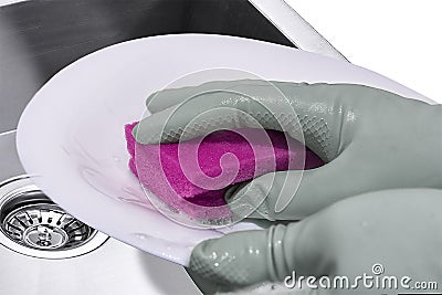 Washing dishes.Close-up of gloved hands Stock Photo