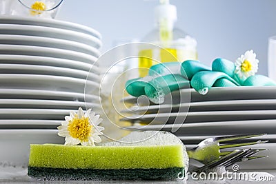 Washing glasses and plates Stock Photo