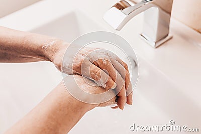 Washing hands rubbing with soap to covid prevention Stock Photo